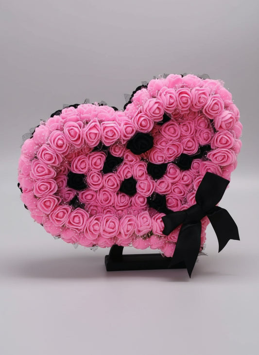 Cœur en rose sur socle